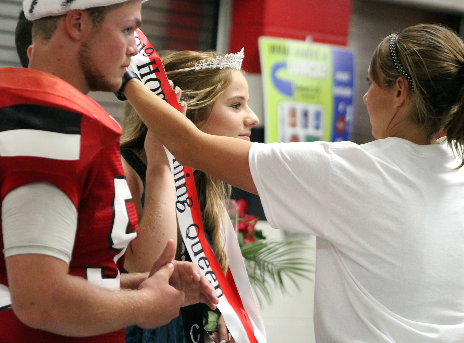 Frontier homecoming queen Abbie Carter receives her sash